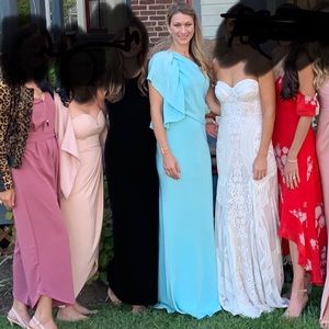 Minique Lhuillier light blue ruffle sleeve dress.